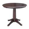 Olivia Mocha Solid Wood Oval Pedestal Table by International Concepts